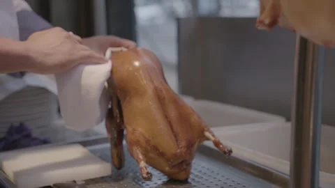 Chef Prepares Roasted Duck on Tray in Beijing Restaurant Kitchen, China Stock Footage 345768122