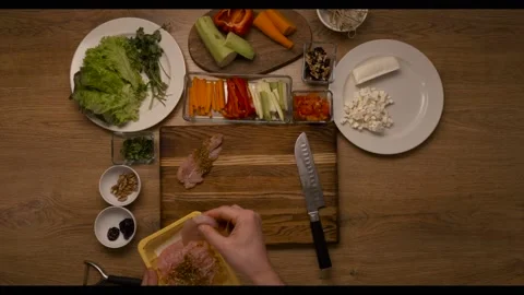 Chef prepares a roll of chicken fillet, top plan. Part 1 Video stock 163879379
