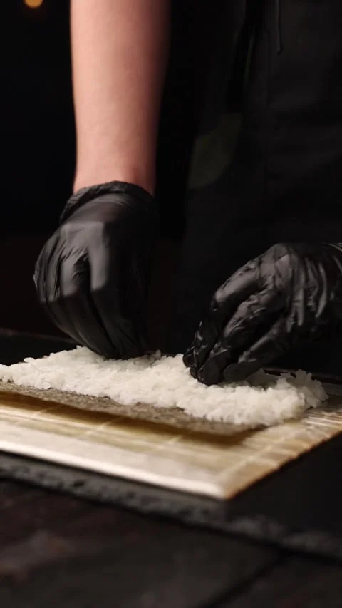 Chef prepares rolls and sushi in the kitchen Stock Footage 266799731