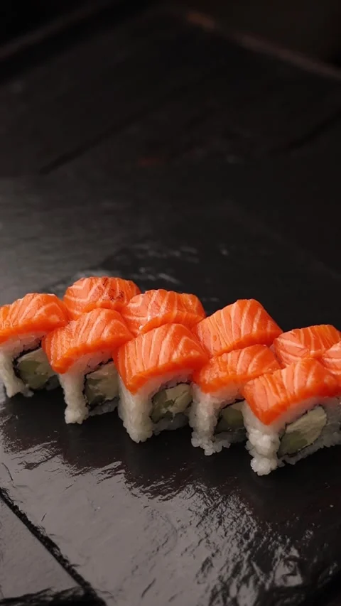 Chef prepares rolls and sushi in the kitchen Stock Footage 266800593