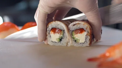 Chef prepares the rolls, close-up Stock Footage 127856060