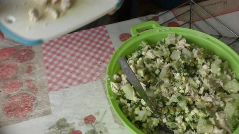 The chef prepares a salad with chicken meat Stock Footage 156677319