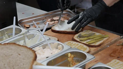 Chef prepares sandwich Stock Footage 64105049