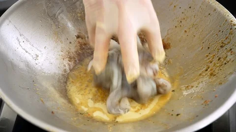 Chef prepares shrimp in a wok Stock Footage 115900267