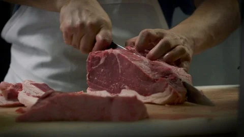 Chef Prepares Steaks for Dinner Service Stock Footage 93992809