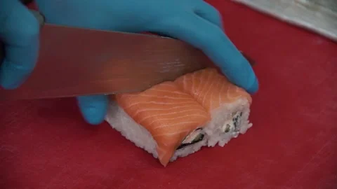 Chef prepares sushi with fish Stock Footage 142664815