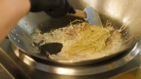 The chef prepares take-away pasta Video stock 148130129