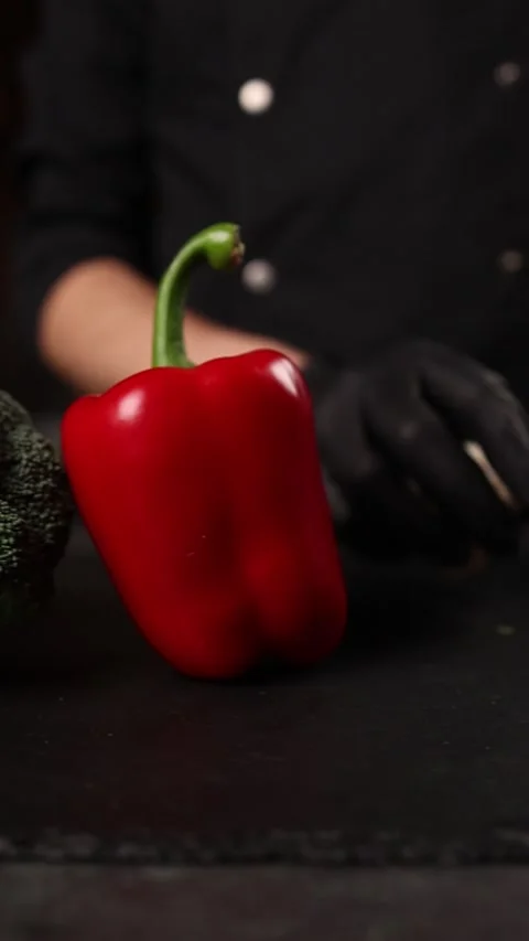 The chef prepares a vegetable dish. Close-up Stock Footage 265672267
