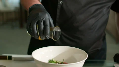 The chef prepares a vegetable salad Stock Footage 136999711