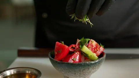 The chef prepares a vegetable salad Stock Footage 137000000