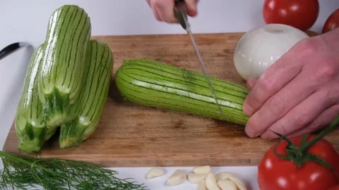 Chef prepares zucchini Stock Footage 201171174