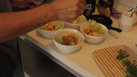 Chef preparing 4 salads on the kitchen counter Stock-Footage 88389789