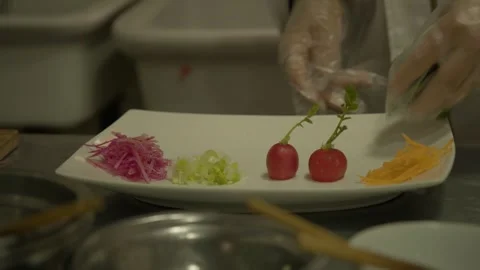 Chef Preparing and Arranging Fresh Vegetable Garnishes in Beijing Restaurant Stock Footage 345883369