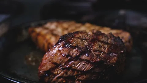 Chef preparing and checking steak temperature in the kitchen Stock Footage 133745803
