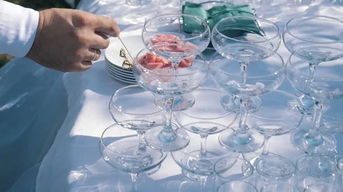 Chef preparing and decorating food, canapés and snacks for a buffet table Stock-Footage 102560123