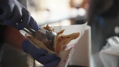 Chef preparing and serving hot pulled pork or kebab in pita bread Stock Footage 314287350