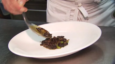 Chef preparing appetizer in restaurant kitchen Stock Footage 54592267