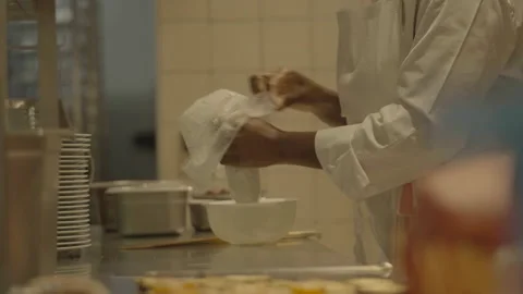 Chef preparing bag in kitchen Stock Footage 336173905