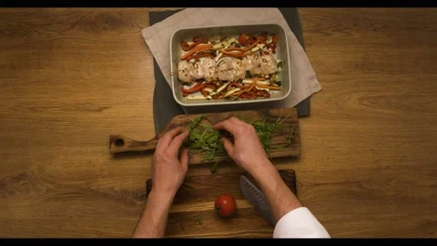 Chef preparing baked chicken fillet, cooking process, finished dish  Video stock 163832782
