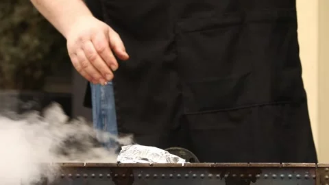 The chef is preparing a BBQ 1 Stock Footage 311763449