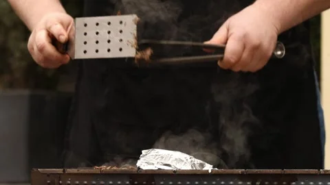 The chef is preparing a BBQ 4 Stock Footage 311763463
