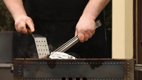 The chef is preparing a BBQ 5 Stock Footage 311763455