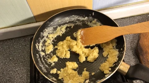 Chef preparing bechamel sauce in a pan. Stock Footage 104134704