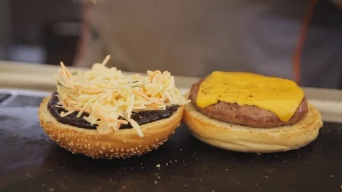 Chef preparing a beef hamburger close up. Stock Footage 74680291