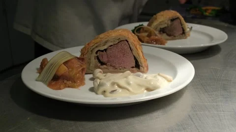 Chef Preparing Beef Wellington with Venison Stock Footage 245969538