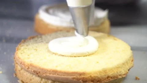 The chef is preparing a birthday or special day cake. Stock Footage 150088804