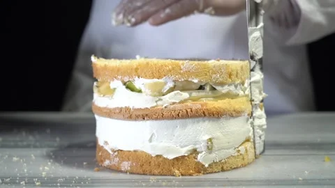 The chef is preparing a birthday or special day cake. Stock Footage 150089122