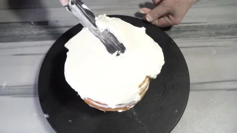 The chef is preparing a birthday or special day cake. Stock Footage 150089185
