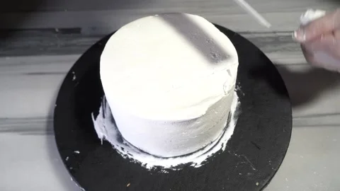 The chef is preparing a birthday or special day cake. Stock Footage 150089427