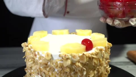 The chef is preparing a birthday or special day cake. Stock Footage 150089878