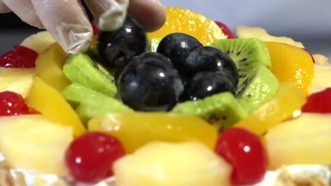The chef is preparing a birthday or special day cake. Stock Footage 150089973