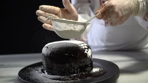 The chef is preparing a birthday or special day cake. Stock Footage 150090786