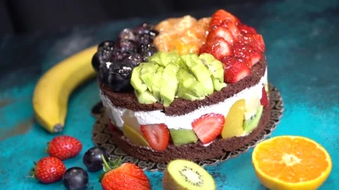 The chef is preparing a birthday or special day cake. Stock Footage 150091375