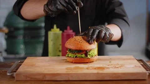 The chef is preparing a Burger. Close up Stock Footage 131152147