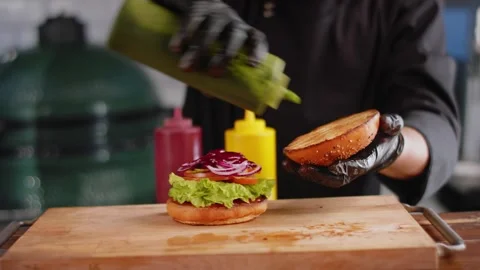 The chef is preparing a Burger. Close up Stock Footage 131152158