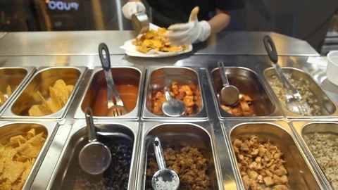 Chef preparing Burrito for customer Stock Footage 72422699