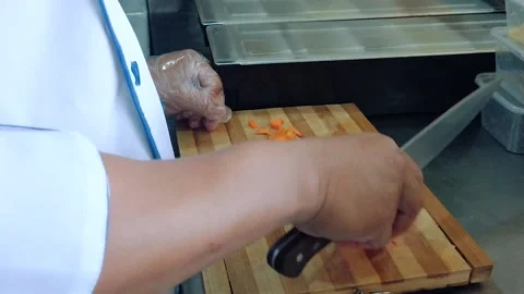 Chef Preparing a Carrot Stock Footage 160886714