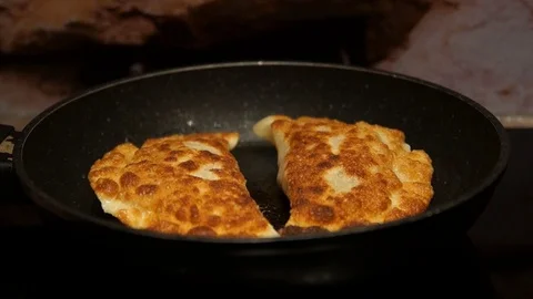 Chef preparing cheburek. Cooking process. Cooking pies. Fried meat pies Stock Footage 98486161