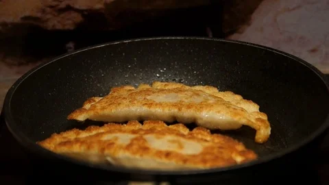 Chef preparing cheburek. Cooking process. Cooking pies. Fried meat pies Stock Footage 98486208