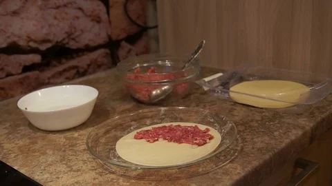 Chef preparing cheburek. Cooking process. Cooking pasties. Minced meat Stock Footage 98486461