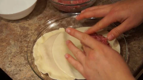 Chef preparing cheburek. Cooking process. Cooking pasties. Minced meat Stock Footage 98486673