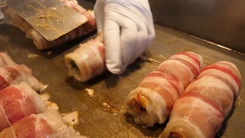 Chef Preparing Cheese Bacon Kimchi Rolls (Samgyeopsal) on Flat-Top Griddle, Kore Video stock 343588105