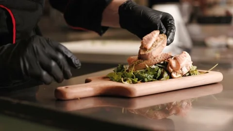 Chef preparing classic mediterranean bruschetta with roasted baguette and salmon Stock Footage 202204460