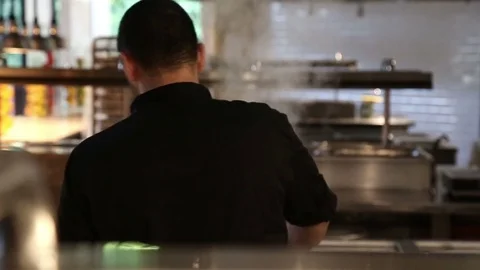 Chef preparing in a commercial kitchen Video stock 74493385