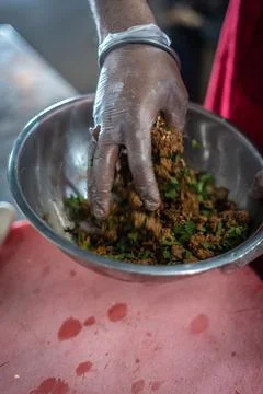 Chef preparing cooking and serving indian cuisine dish Stock Photos