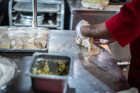 Chef preparing cooking and serving indian cuisine dish Stock Photos